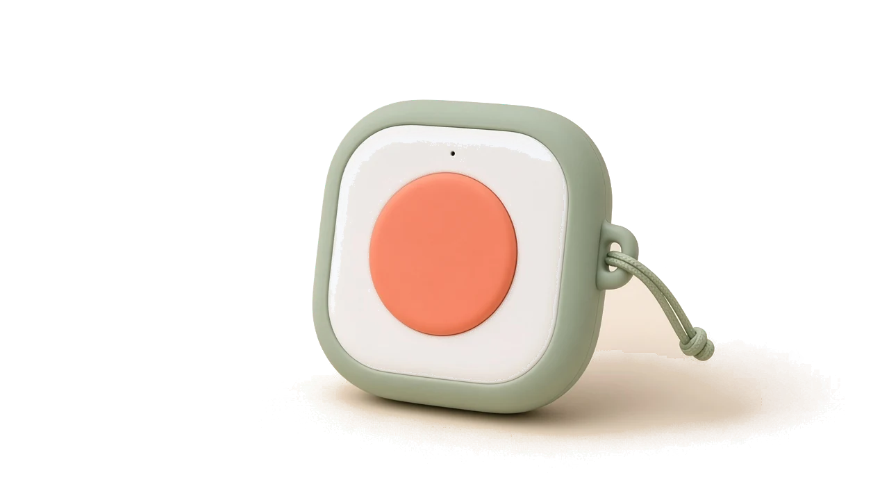 An early direction for the Rainbow device: a sage-green square with one coral button and a cord loop